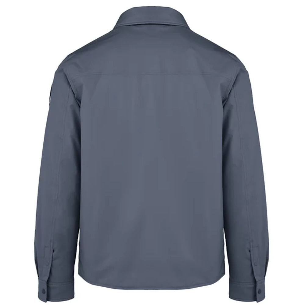 A flat-lay studio product shot of a Bomboogie men's technical fabric overshirt in a clean navy shade, centered on a white background. The shirt jacket features a classic pointed collar, a snap-button front closure, two matching rectangular flap chest pockets, and buttoned long-sleeve cuffs.