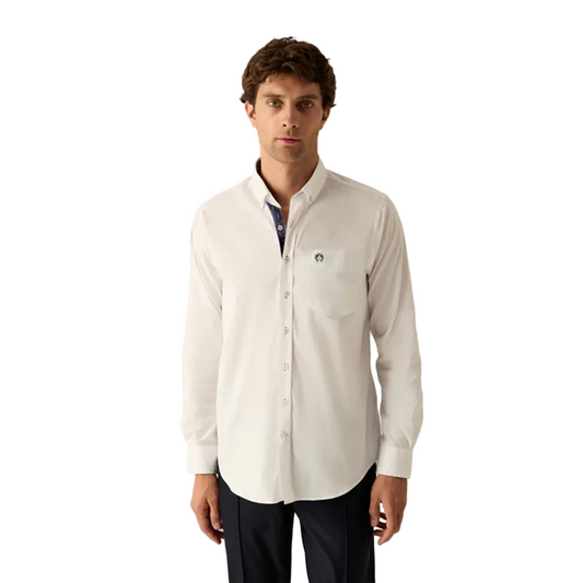 Man wearing a Campione white long sleeves shirt with Campione logo