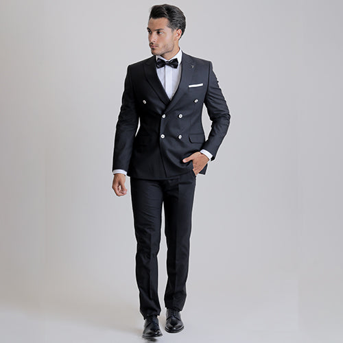 Double breasted dark blue suit with white buttons