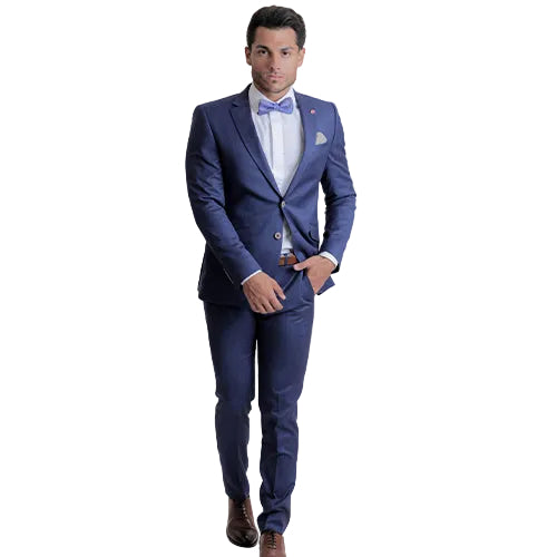 A man wearing a Digel royal blue suit with a white shirt and a bowtie.