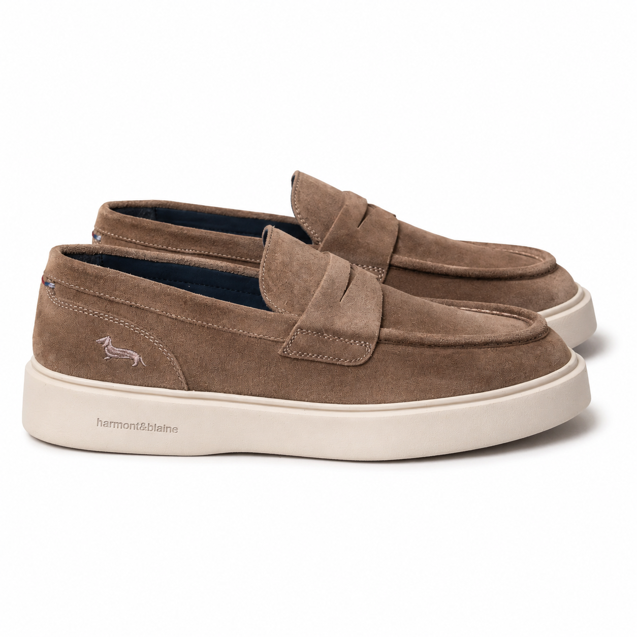 Harmont & Blaine men's taupe suede penny loafers with slip-on design, lightweight white rubber sole, and signature dachshund logo.