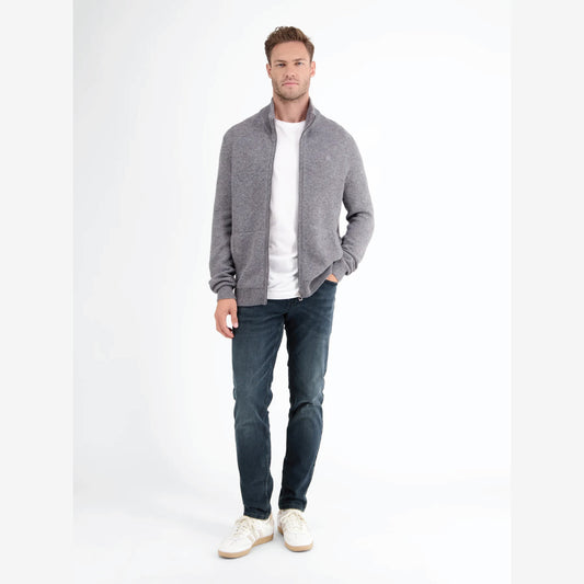 Man wearing Lerros Conlin dark blue comfort stretch denim jeans, slim fit, styled with a grey zip cardigan, front view studio photo, available at Kayagan