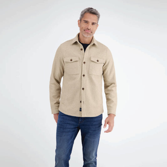 Man wearing a beige Lerros urban-style shirt jacket in wool look with chest pockets, styled with denim jeans, front view studio photo, available at Kayagan