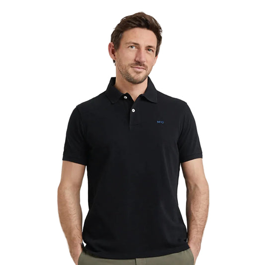 Model wearing a McGregor men's classic regular fit black polo shirt with a ribbed collar and short sleeves on a white background.