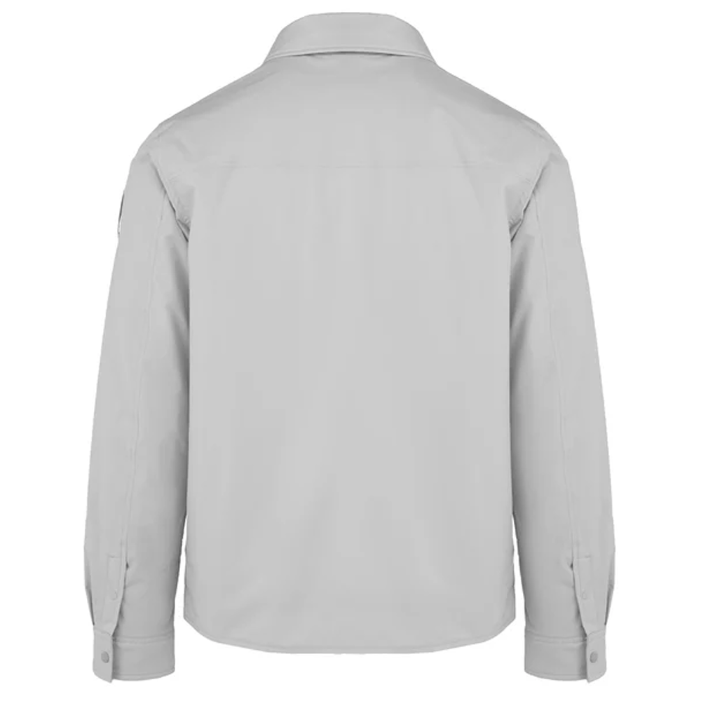 A flat-lay studio product shot of a Bomboogie men's technical fabric overshirt in a clean light grey shade, centered on a white background. The shirt jacket features a classic pointed collar, a snap-button front closure, two matching rectangular flap chest pockets, and buttoned long-sleeve cuffs.