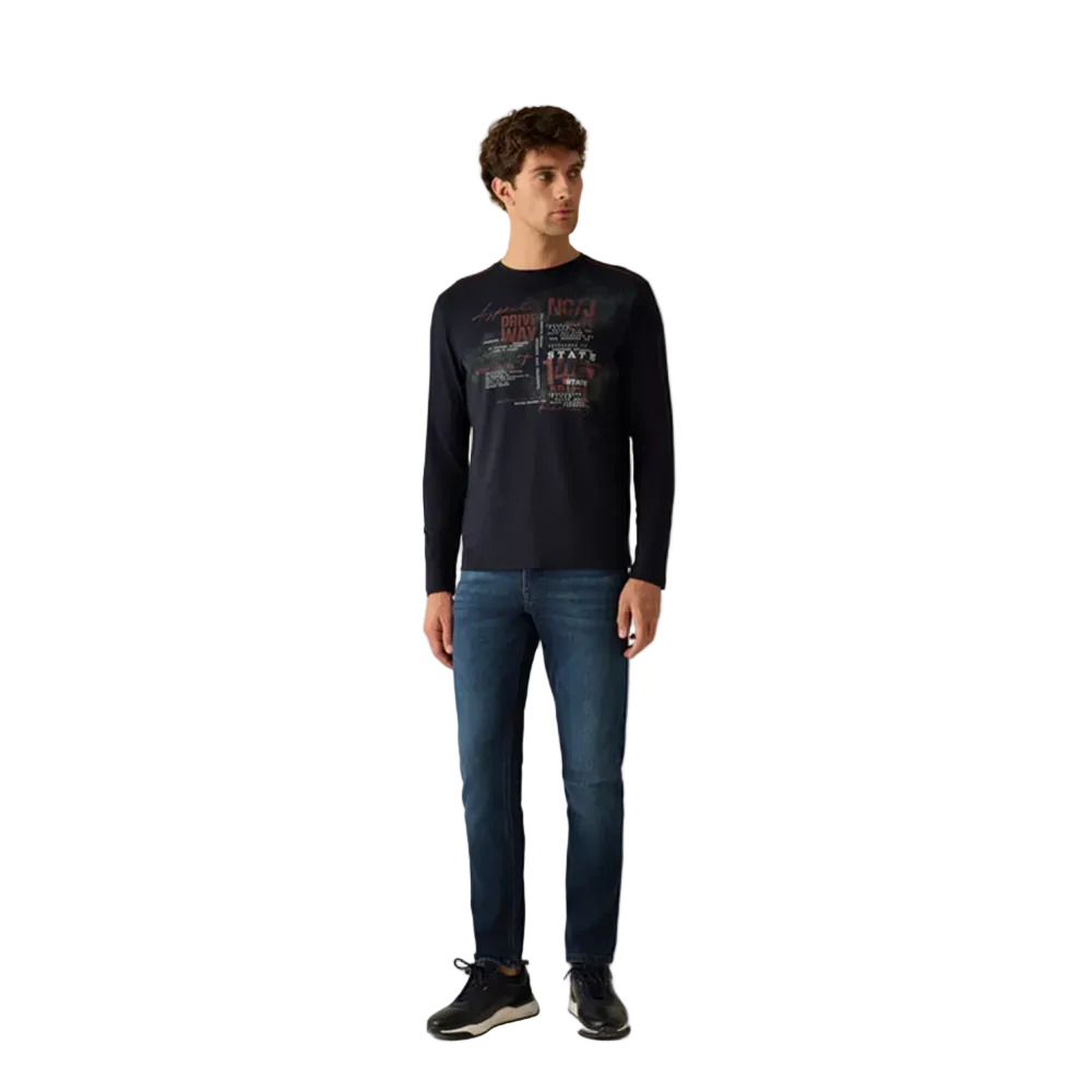 Man wearing Campione Claudio navy long-sleeved graphic t-shirt with printed text design and orange stitching detail, Kayagan, Lebanon