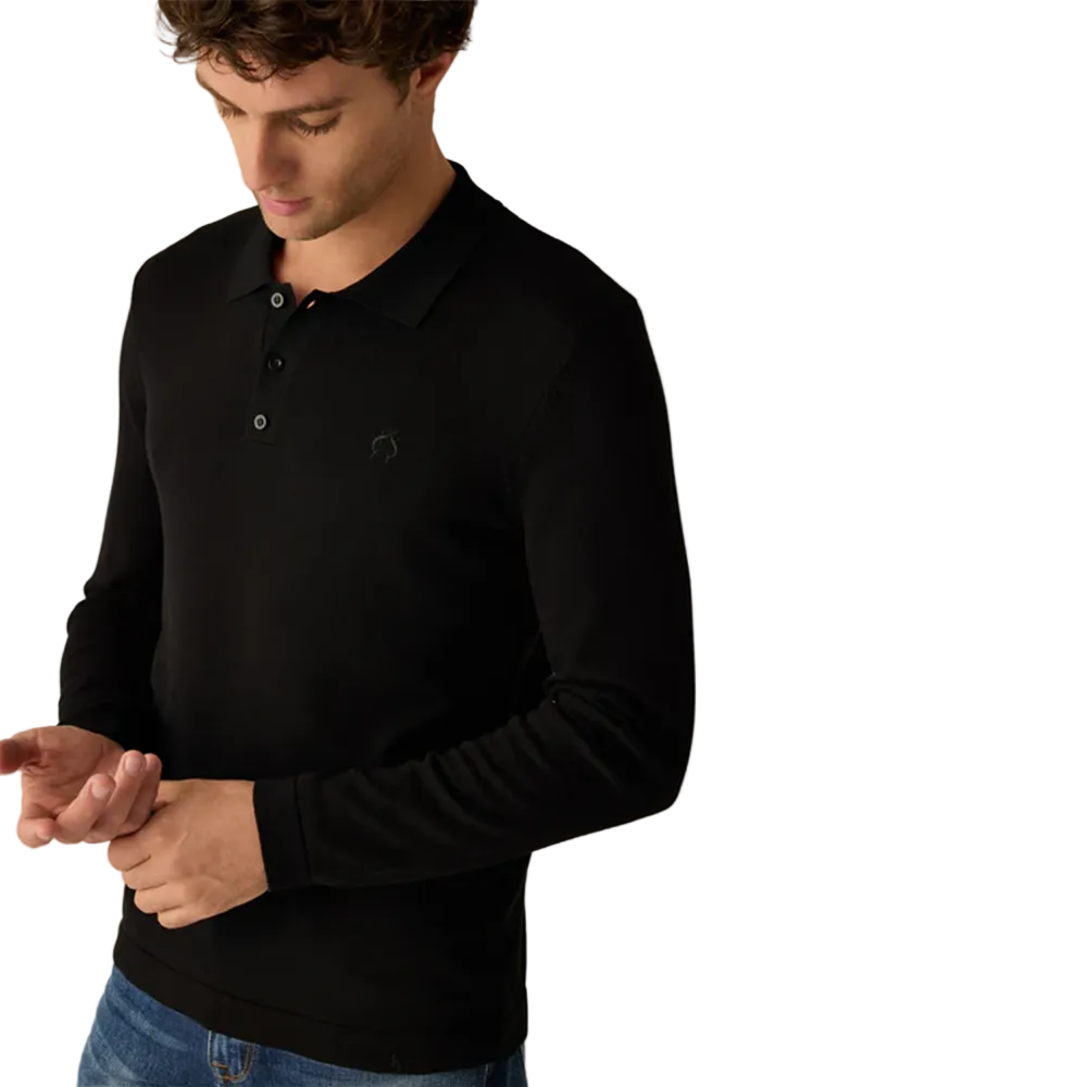 Man wearing Campione black long-sleeved polo shirt with ribbed collar, and an embroidered Campione logo on the chest, Kayagan, Lebanon