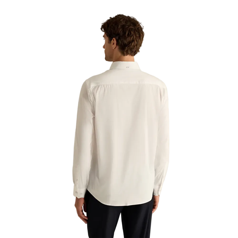 Man wearing a Campione white long sleeves shirt with Campione logo