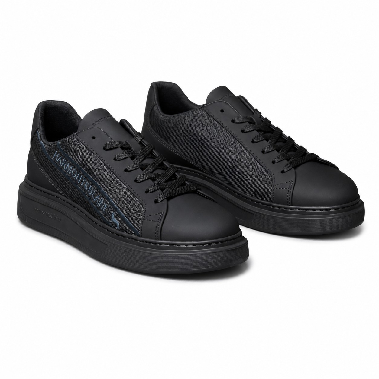 Harmont & Blaine men's black sneakers with textured side panels, tonal lace-up closure, cushioned black rubber sole, and signature branded detailing.