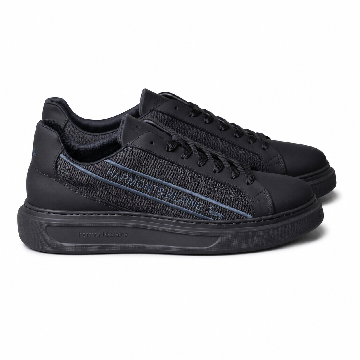Harmont & Blaine men's black sneakers with textured side panels, tonal lace-up closure, cushioned black rubber sole, and signature branded detailing.