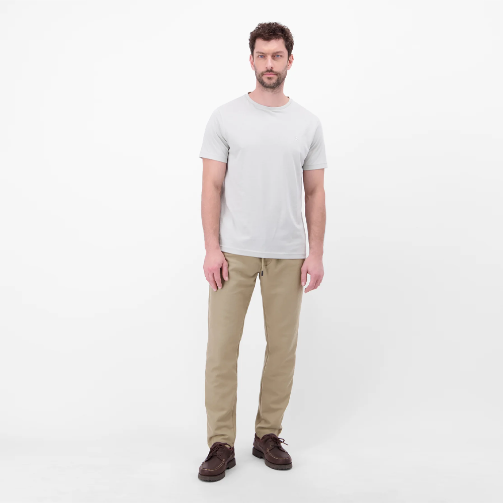 Man wearing beige Lerros lightweight chinos with drawstring waist and pleated front, front view studio photo, available at Kayagan