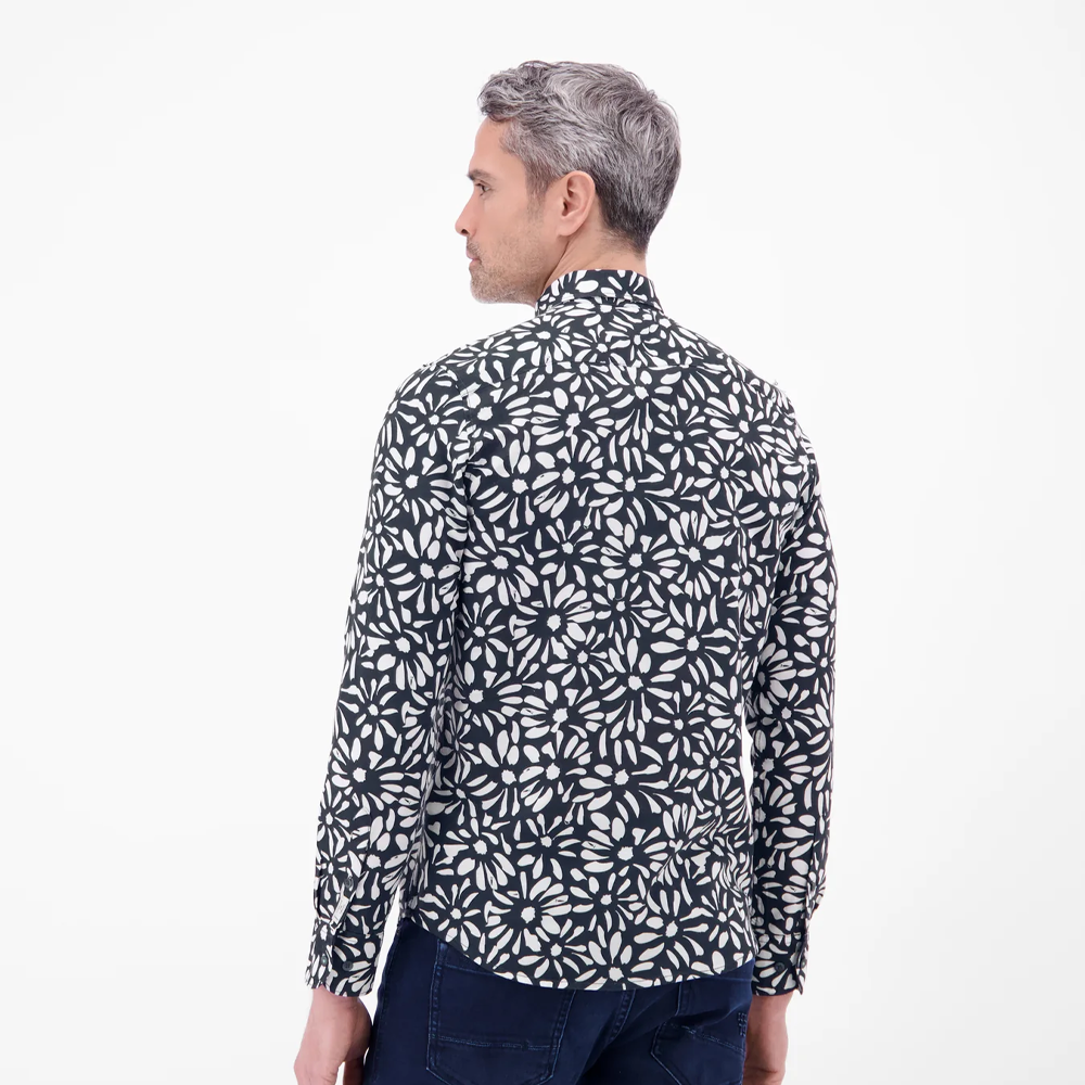 Man wearing a black and white floral print Lerros long-sleeved shirt with navy jeans, front view studio photo, available at Kayagan
