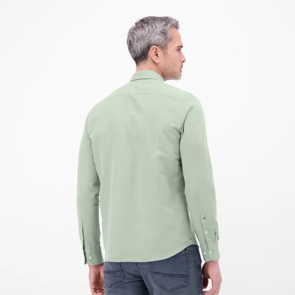 Man wearing a ice green Lerros cotton-linen blend shirt with navy chinos, front view studio photo, available at Kayagan