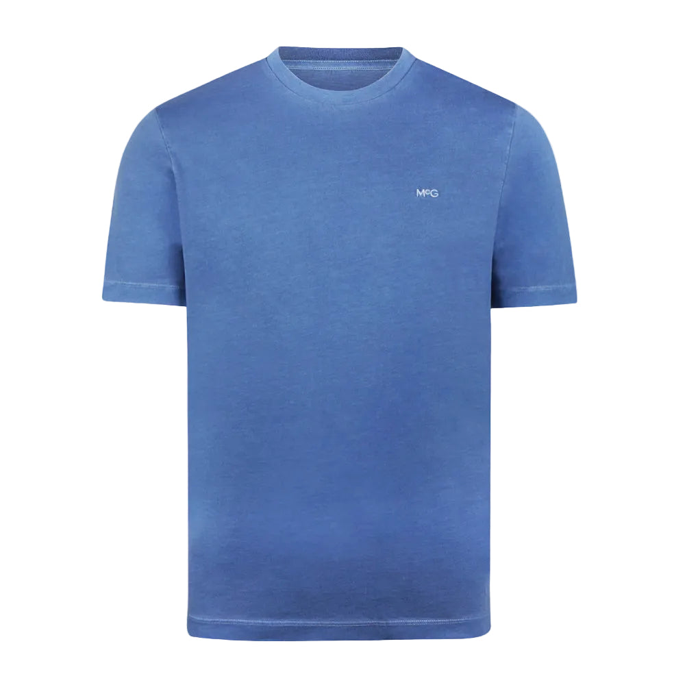 Front view of a McGregor men's garment dyed crew neck T-shirt in vintage blue with short sleeves and embroidered chest logo on a white background.