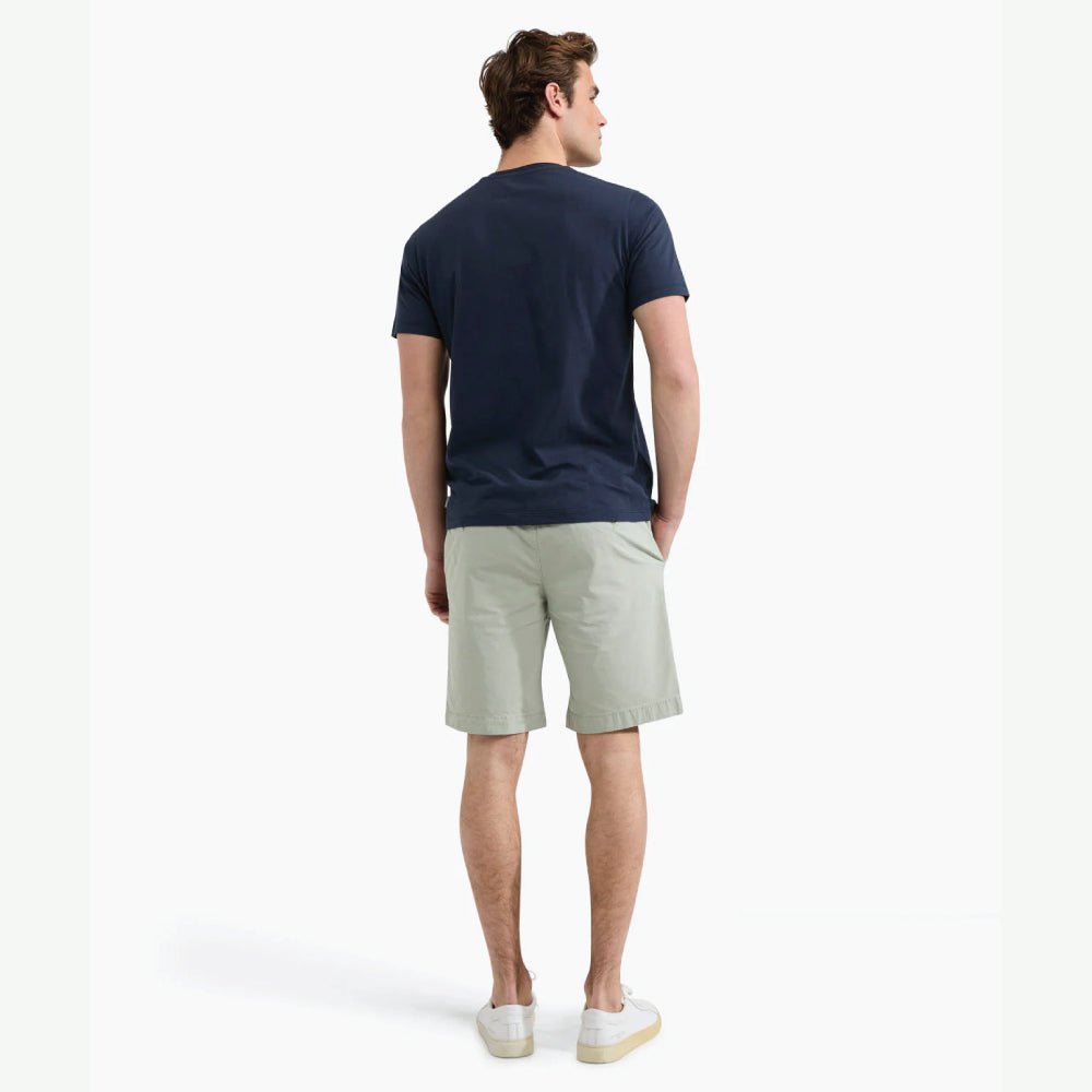 Model wearing a McGregor men's navy NY graphic crew neck T-shirt with a vintage New York print and short sleeves on a white background.