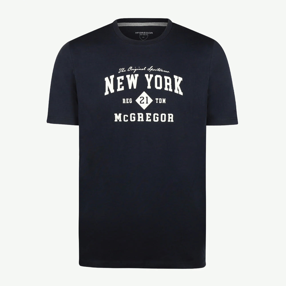 Model wearing a McGregor men's navy NY graphic crew neck T-shirt with a vintage New York print and short sleeves on a white background.