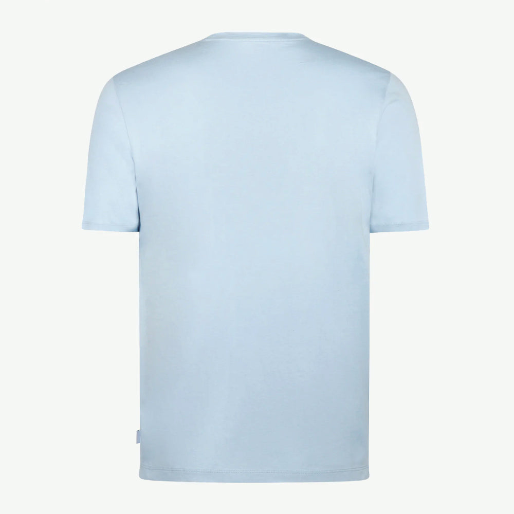 Model wearing a McGregor men's light blue NY graphic crew neck T-shirt with a vintage New York print and short sleeves on a white background.