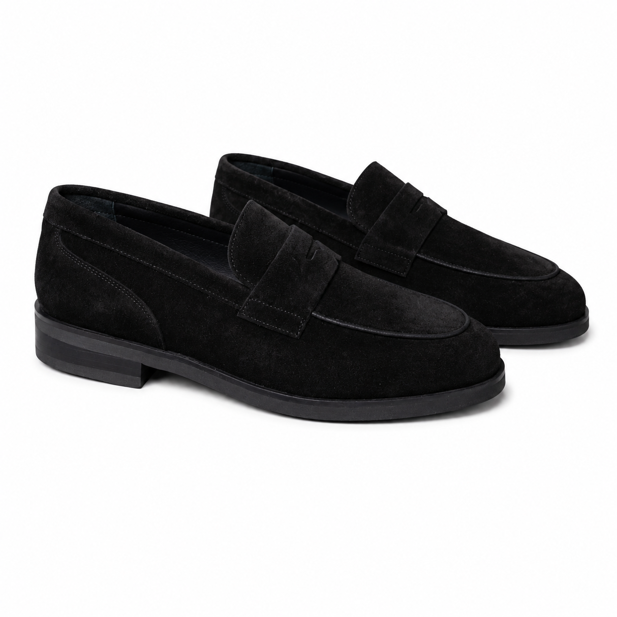 Pedro black suede penny loafers with a refined silhouette, cushioned comfort, and versatile style for formal and smart-casual occasions.