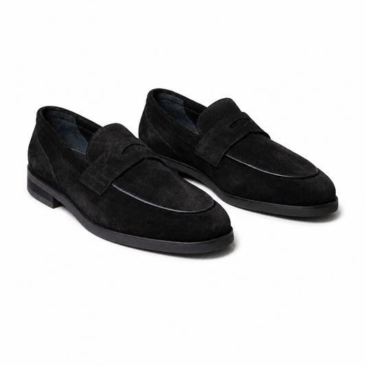 Pedro black suede penny loafers with a refined silhouette, cushioned comfort, and versatile style for formal and smart-casual occasions.