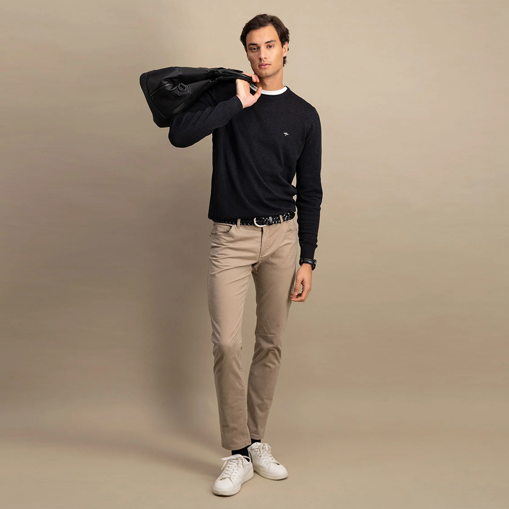 Man wearing a charcoal Fynch Hatton fine knit sweater with round neck, styled with beige chinos, front view studio photo, available at Kayagan