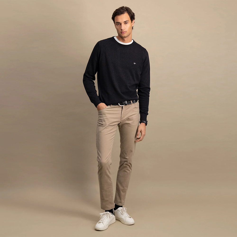 Man wearing a charcoal Fynch Hatton fine knit sweater with round neck, styled with beige chinos, front view studio photo, available at Kayagan