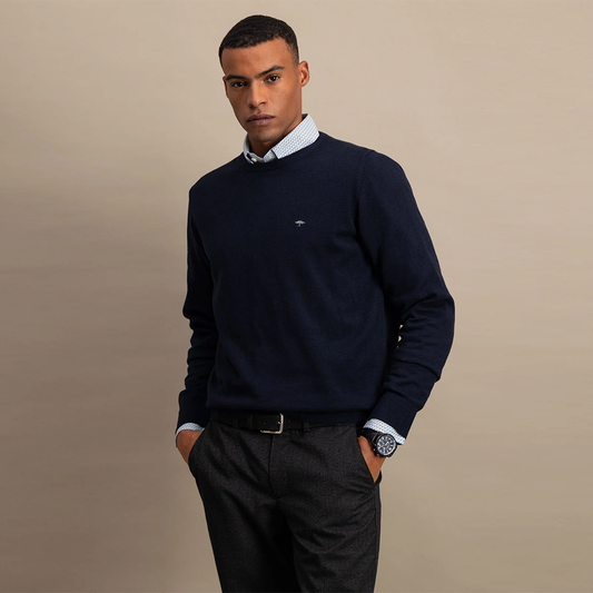 Man wearing a navy Fynch Hatton fine knit sweater with round neck, front view studio photo, available at Kayagan