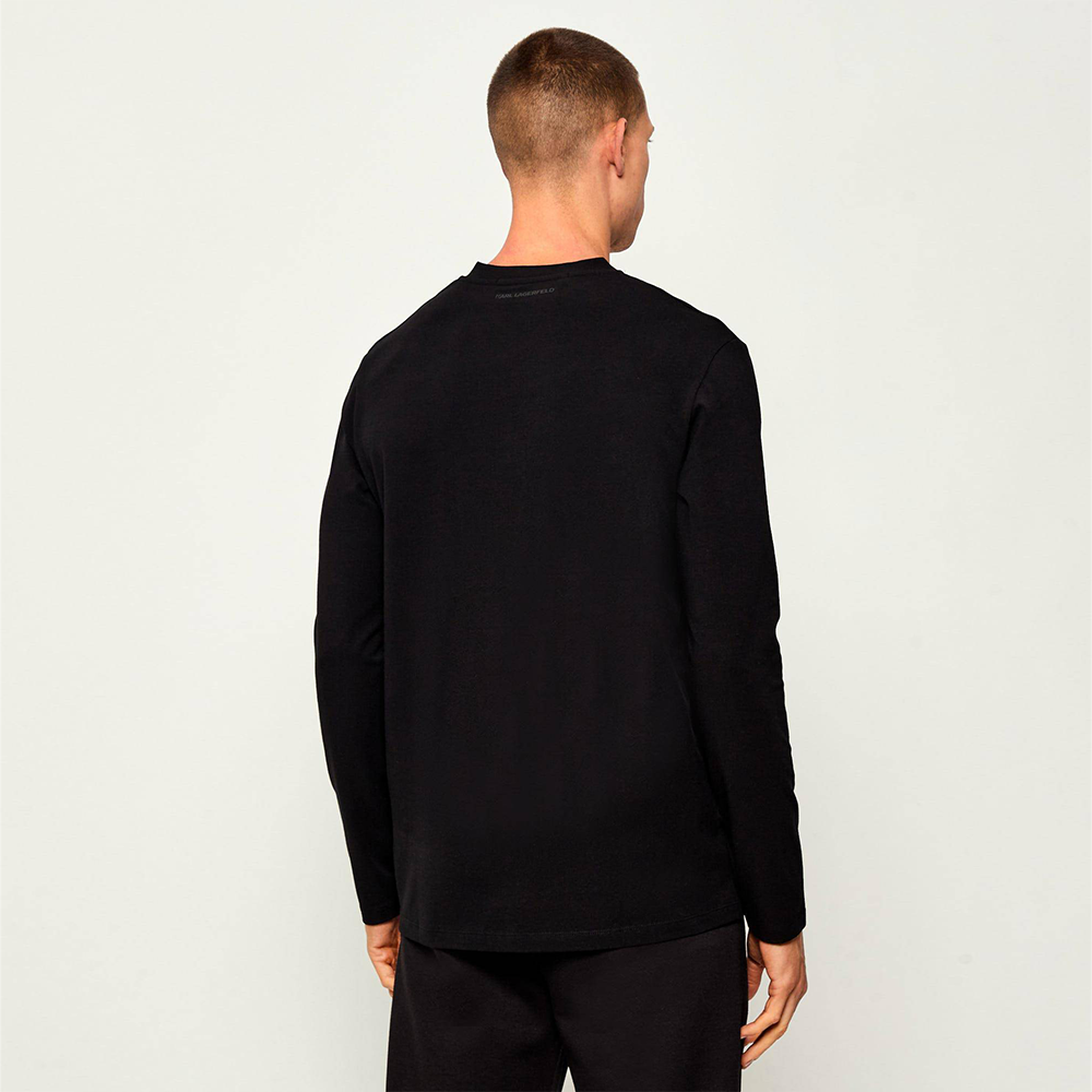 Man wearing Karl Lagerfeld black longsleeve V-neck shirt with embroidered logo, paired with black joggers, Kayagan