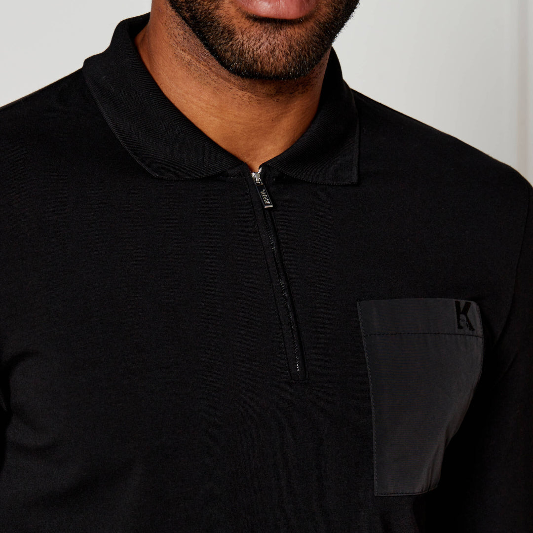 Karl Lagerfeld men's regular fit long sleeve polo shirt with a half-zip collar, utility chest pocket, and premium stretch fabric.