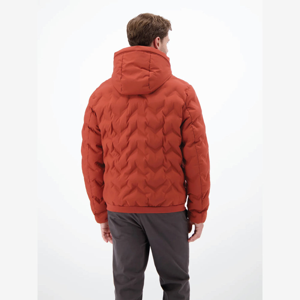 Man wearing a rust, burnt red Lerros quilted jacket with hood, styled with grey trousers, back view studio photo