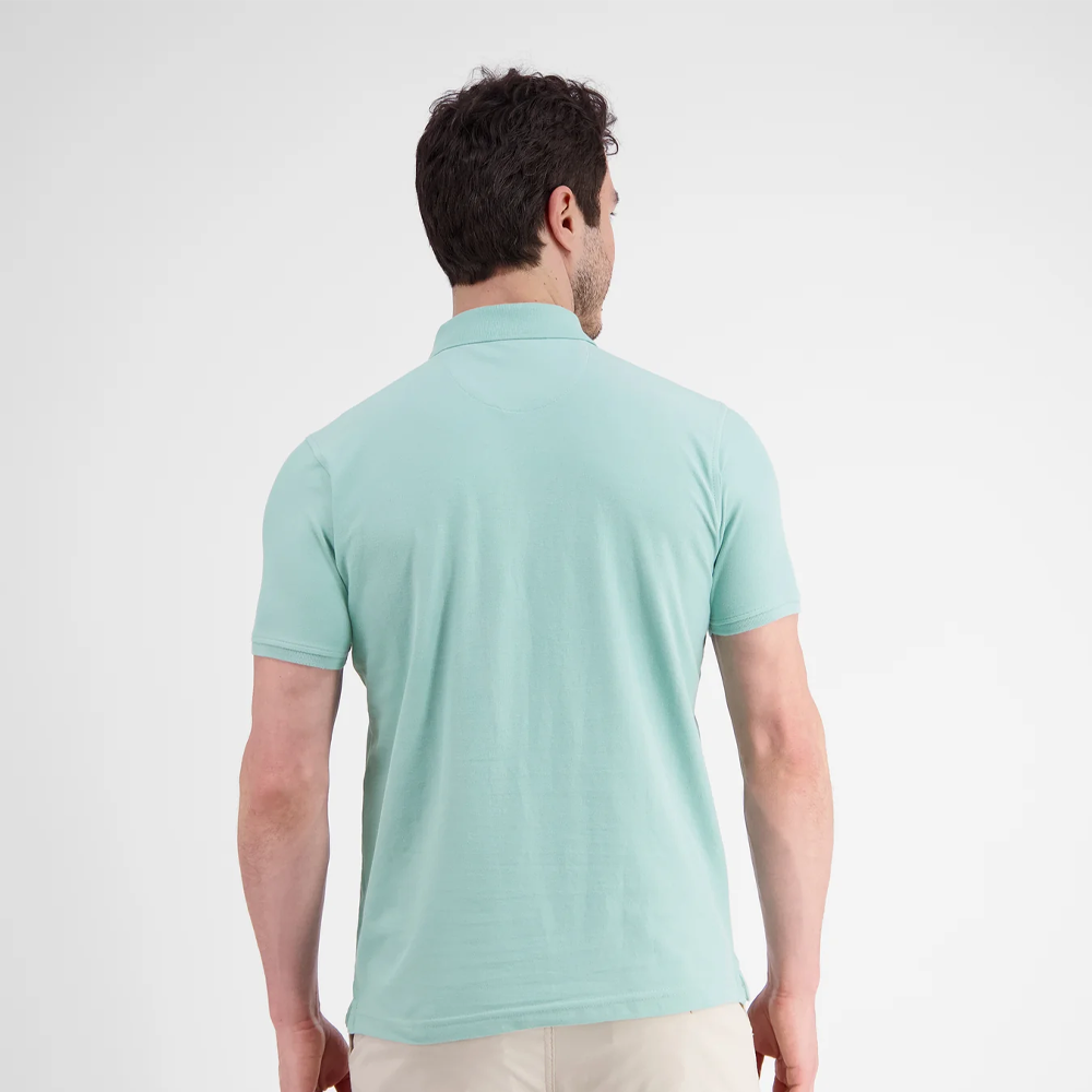 Man wearing a mint Lerros classic polo shirt in Cool and Dry piqué fabric, front view studio photo