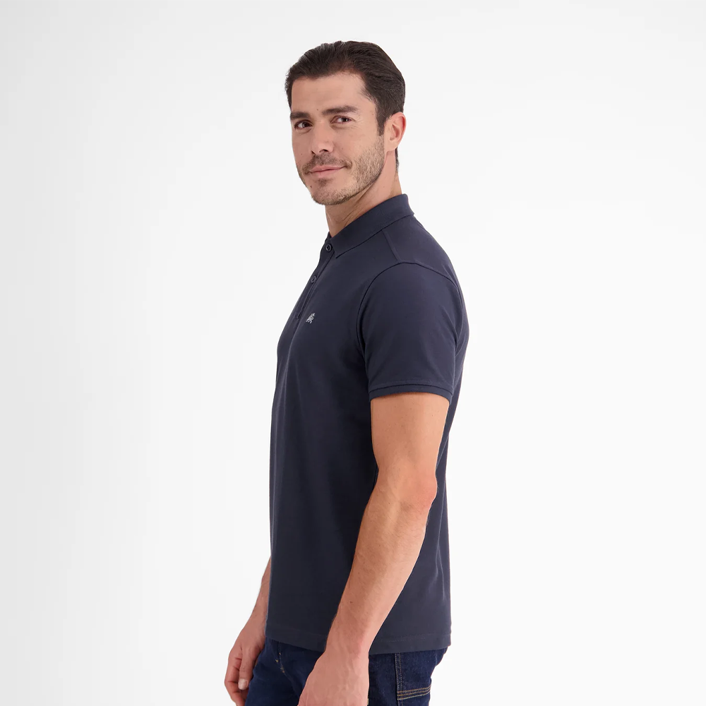 Man wearing a navy Lerros classic polo shirt in Cool and Dry piqué fabric, front view studio photo