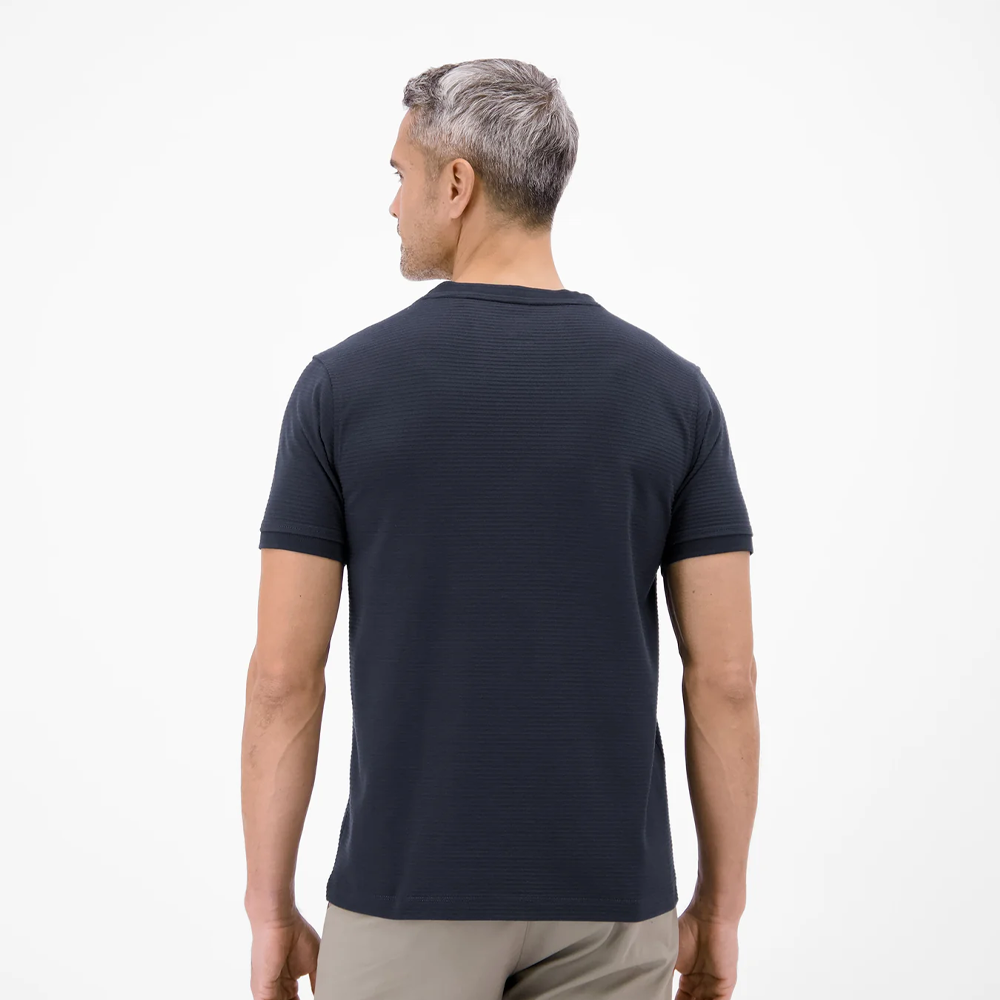 Man wearing a navy Lerros t-shirt with round collar, button placket, and Cool and Dry fabric, front view studio photo, available at ayagan