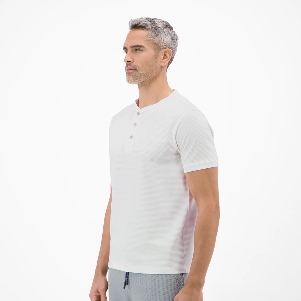 Man wearing a white Lerros t-shirt with round collar, button placket, and Cool and Dry fabric, front view studio photo, available at ayagan