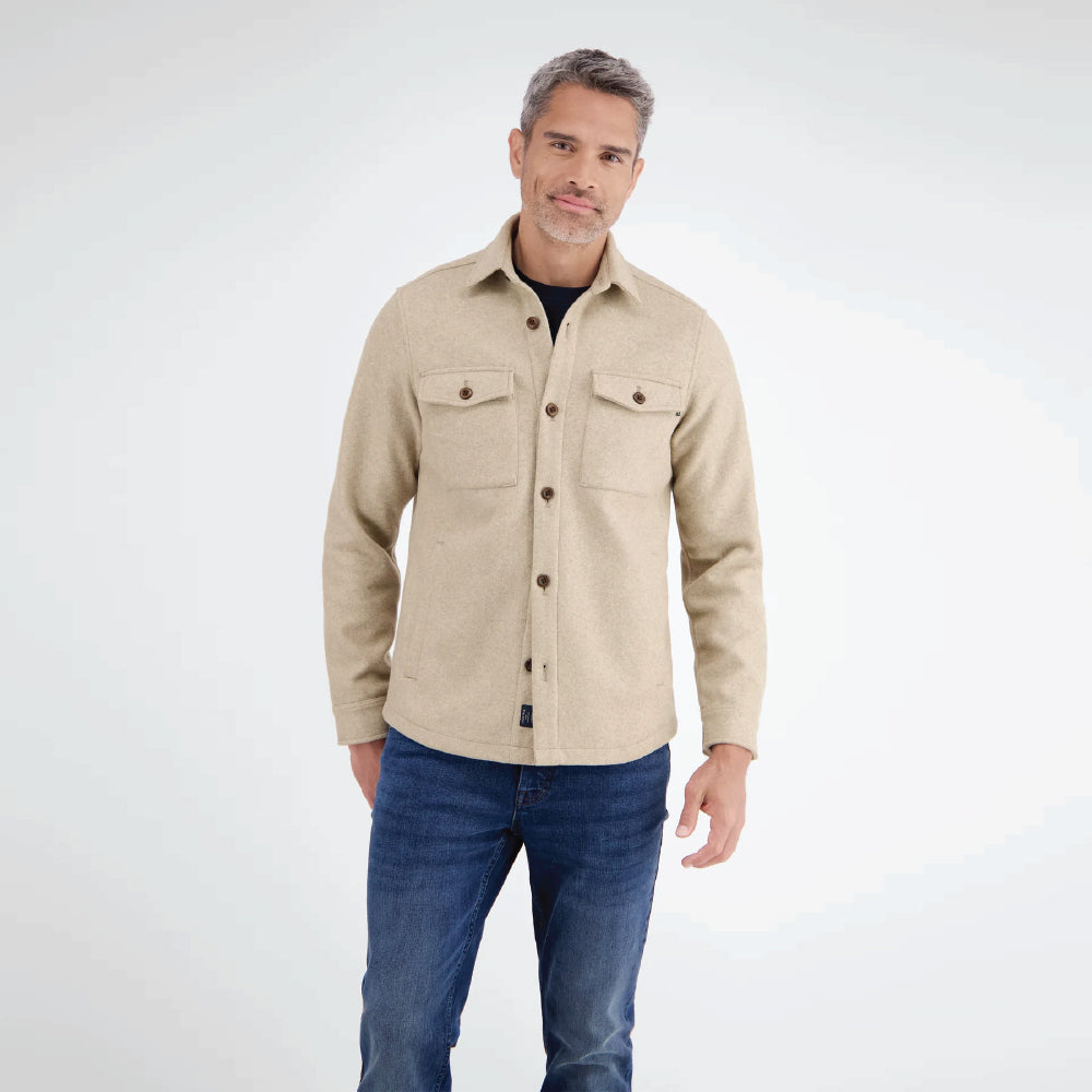 Man wearing a beige Lerros urban-style shirt jacket in wool look with chest pockets, styled with denim jeans, front view studio photo, available at Kayagan