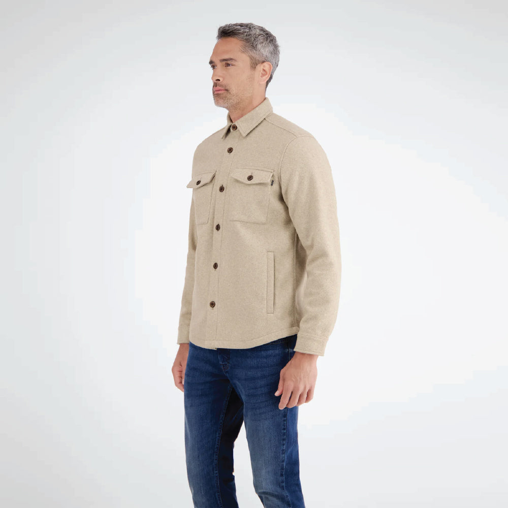 Man wearing a beige Lerros urban-style shirt jacket in wool look with chest pockets, styled with denim jeans, front view studio photo, available at Kayagan