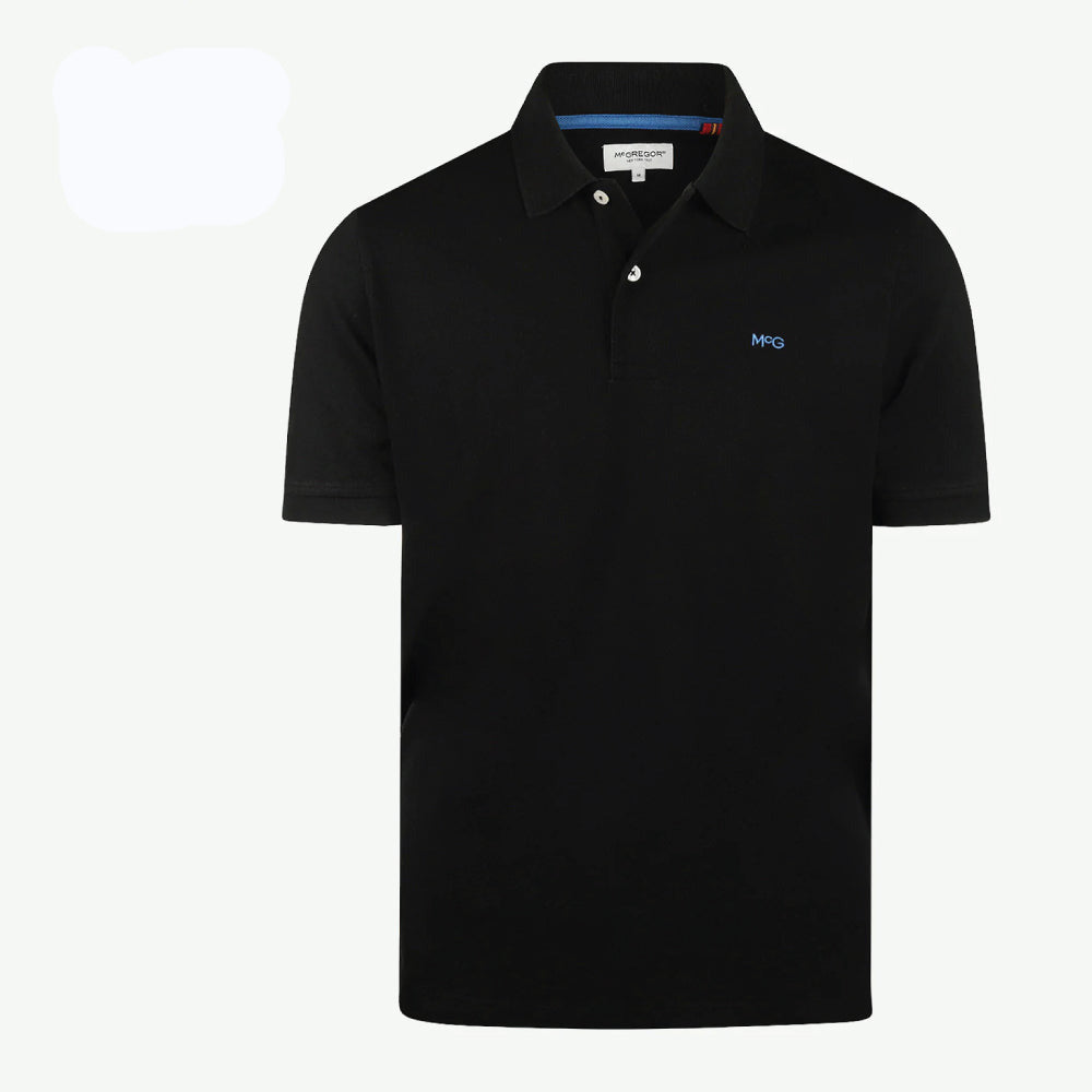 Model wearing a McGregor men's classic regular fit black polo shirt with a ribbed collar and short sleeves on a white background.