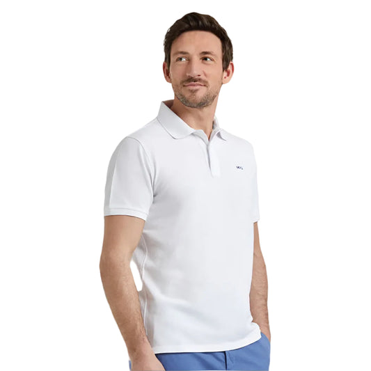 Man wearing a McGregor men's classic regular fit white polo shirt with a ribbed collar and short sleeves on a white background.