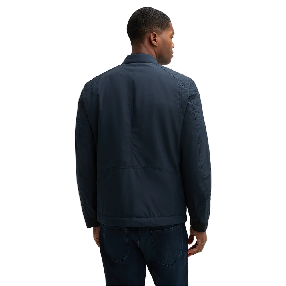 Man wearing Strellson Flex Cross Rockston dark blue biker jacket with stand collar and chest zip pocket