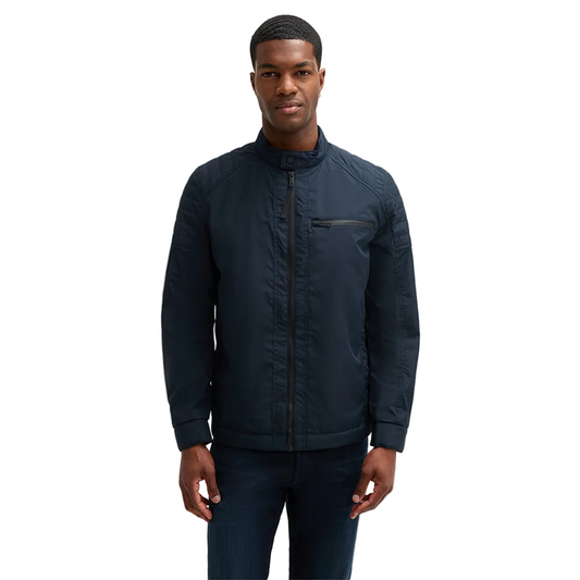 Man wearing Strellson Flex Cross Rockston dark blue biker jacket with stand collar and chest zip pocket