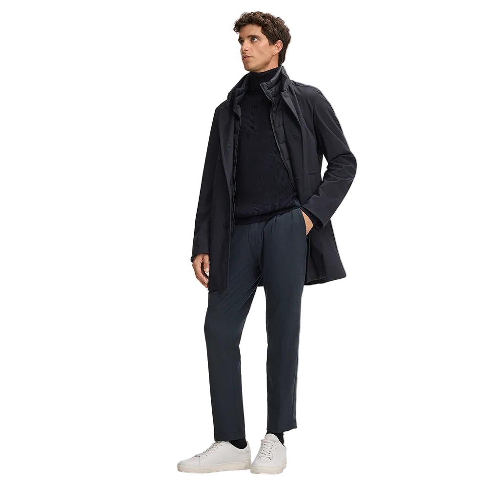 Man wearing Strellson Hamilton Roll Neck Jumper in dark blue ribbed knit, available at Kayagan