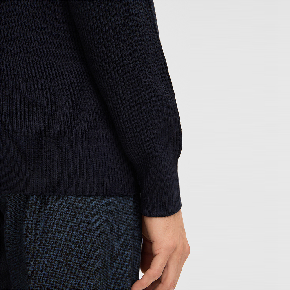 Man wearing Strellson Hamilton Roll Neck Jumper in dark blue ribbed knit, available at Kayagan