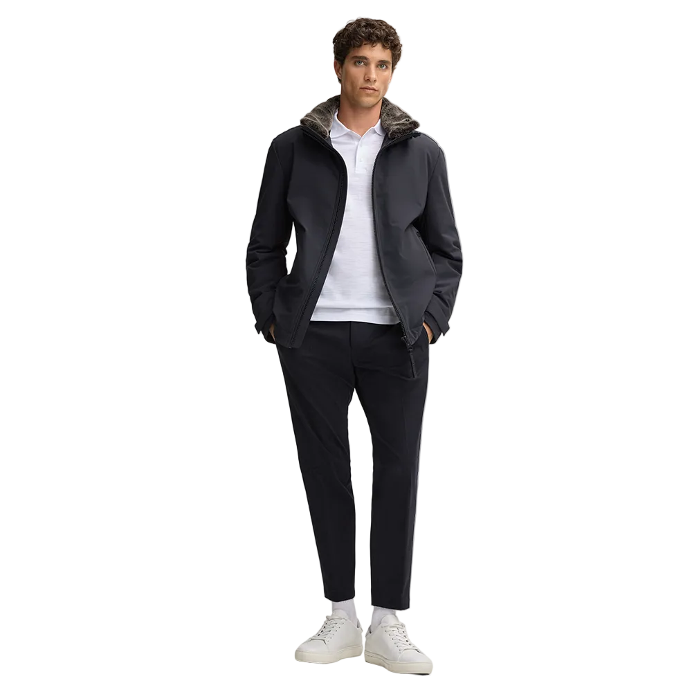 Man wearing Strellson Lucca navy water-repellent jacket with faux-fur lined hood