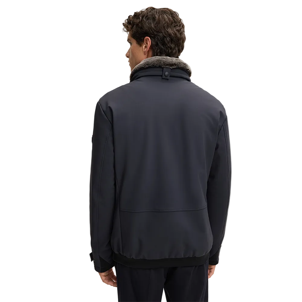 Man wearing Strellson Lucca navy water-repellent jacket with faux-fur lined hood
