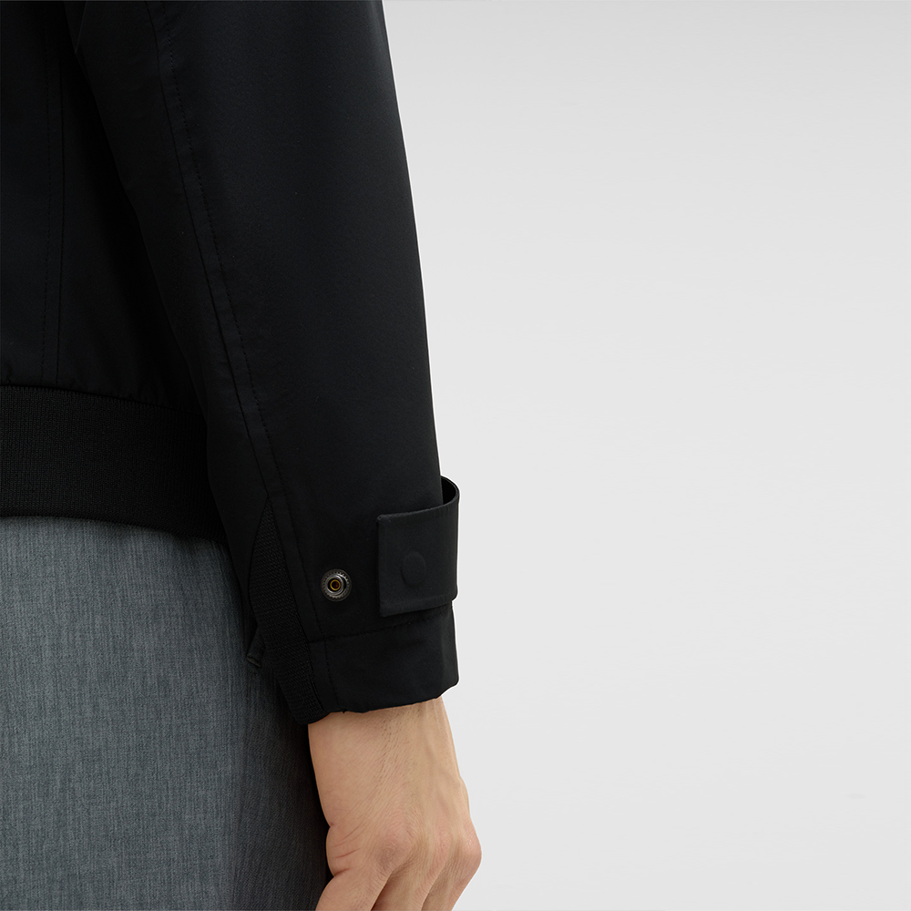 Man wearing Strellson Lucca Windbreaker Jacket in black with stand collar and zip front, Kayagan