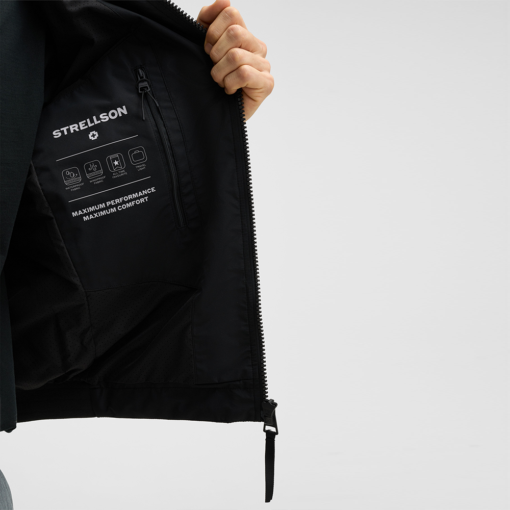 Man wearing Strellson Lucca Windbreaker Jacket in black with stand collar and zip front, Kayagan