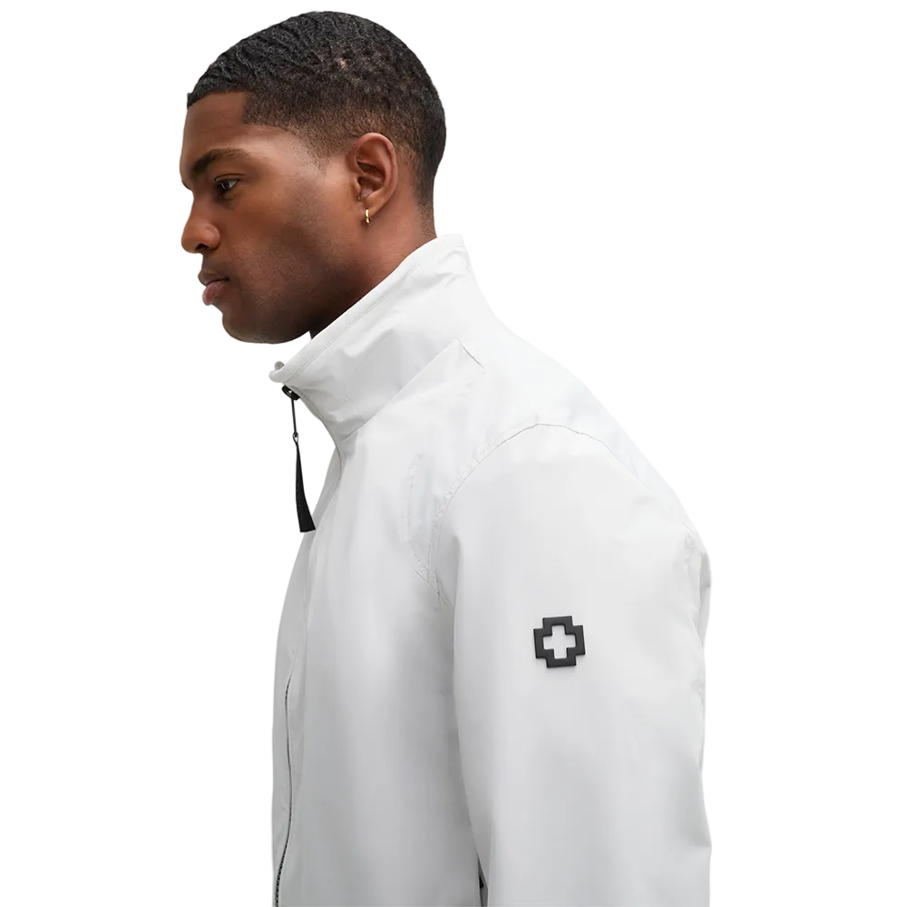 Man wearing Strellson Lucca Windbreaker Jacket in off-white with stand collar and zip front, and embroidered logo on the left arm, Kayagan