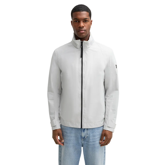 Man wearing Strellson Lucca Windbreaker Jacket in off-white with stand collar and zip front, and embroidered logo on the left arm, Kayagan